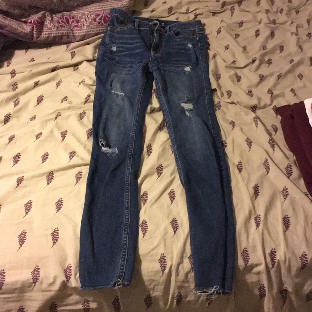 Dark blue distressed jeans